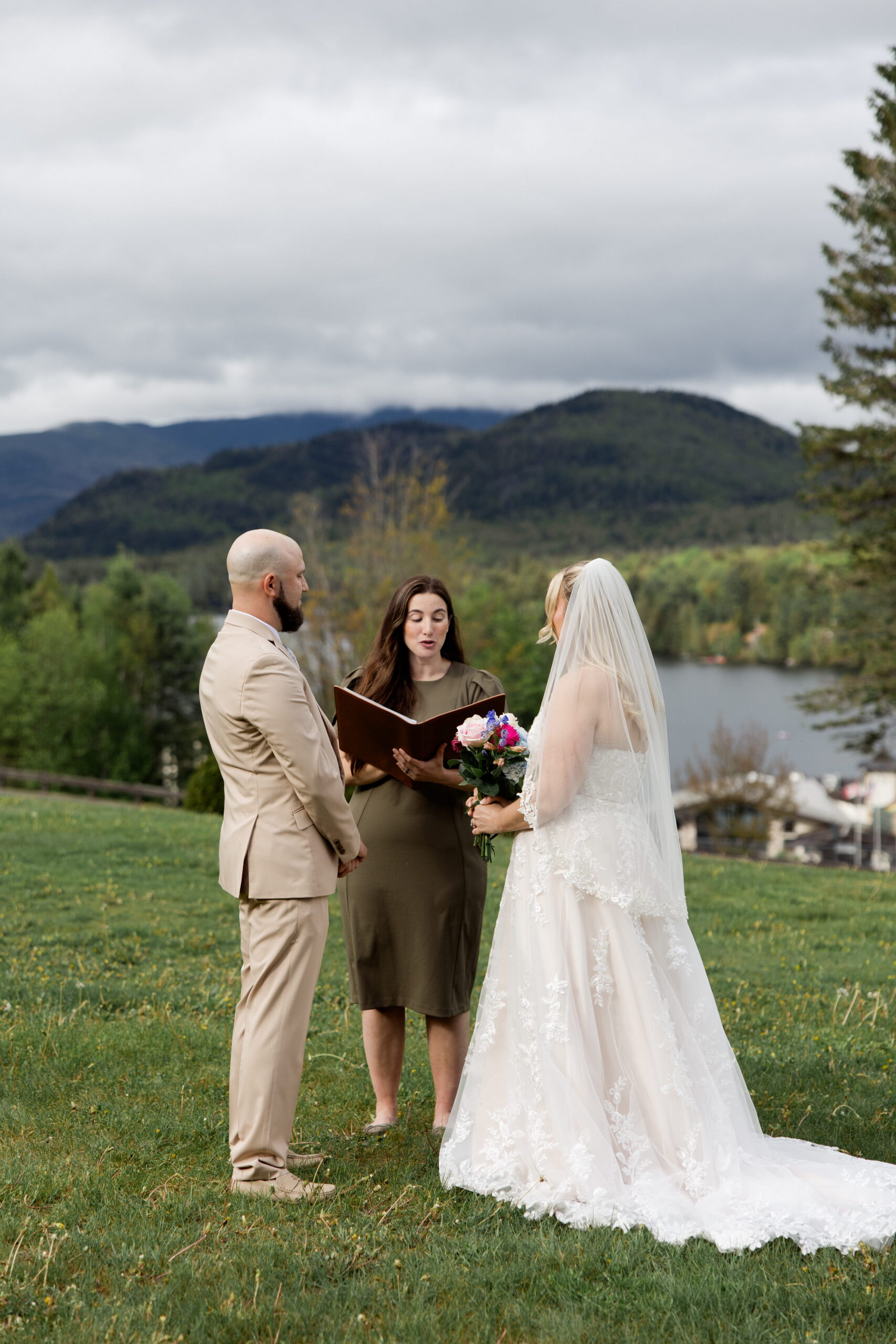 Elopement officiant leads a couple through their ceremony in the Adirondacks. 